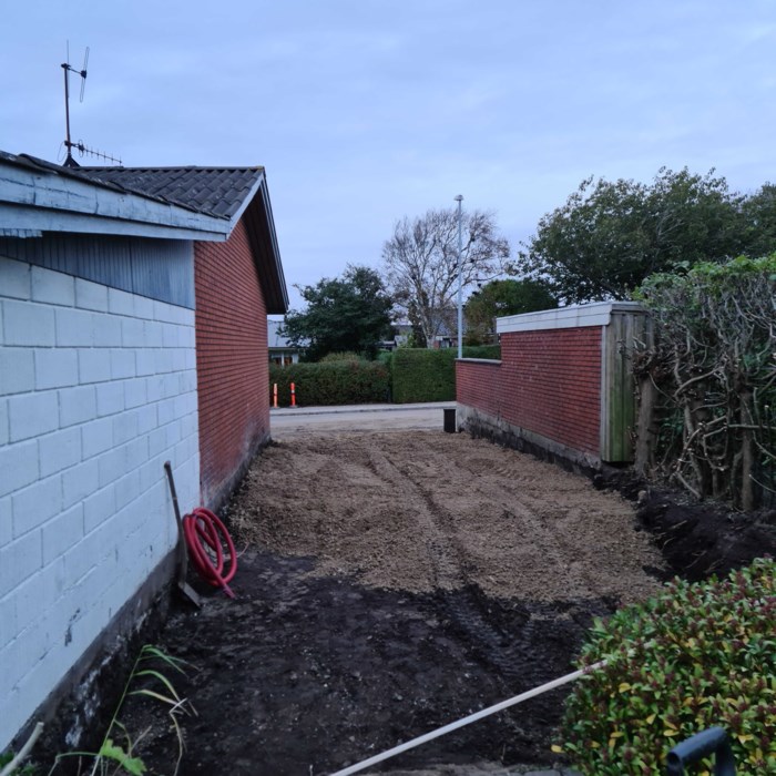 Hjemmelavet carport med værksted